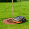 tree protection ring rusty metal_with robot lawn mower