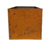 metal plant pot in a rusty finish